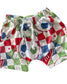 A pair of children's shorts featuring a colorful patchwork pattern with soccer balls, green checkered flags, and red, white, and blue squares, complete with a white drawstring.